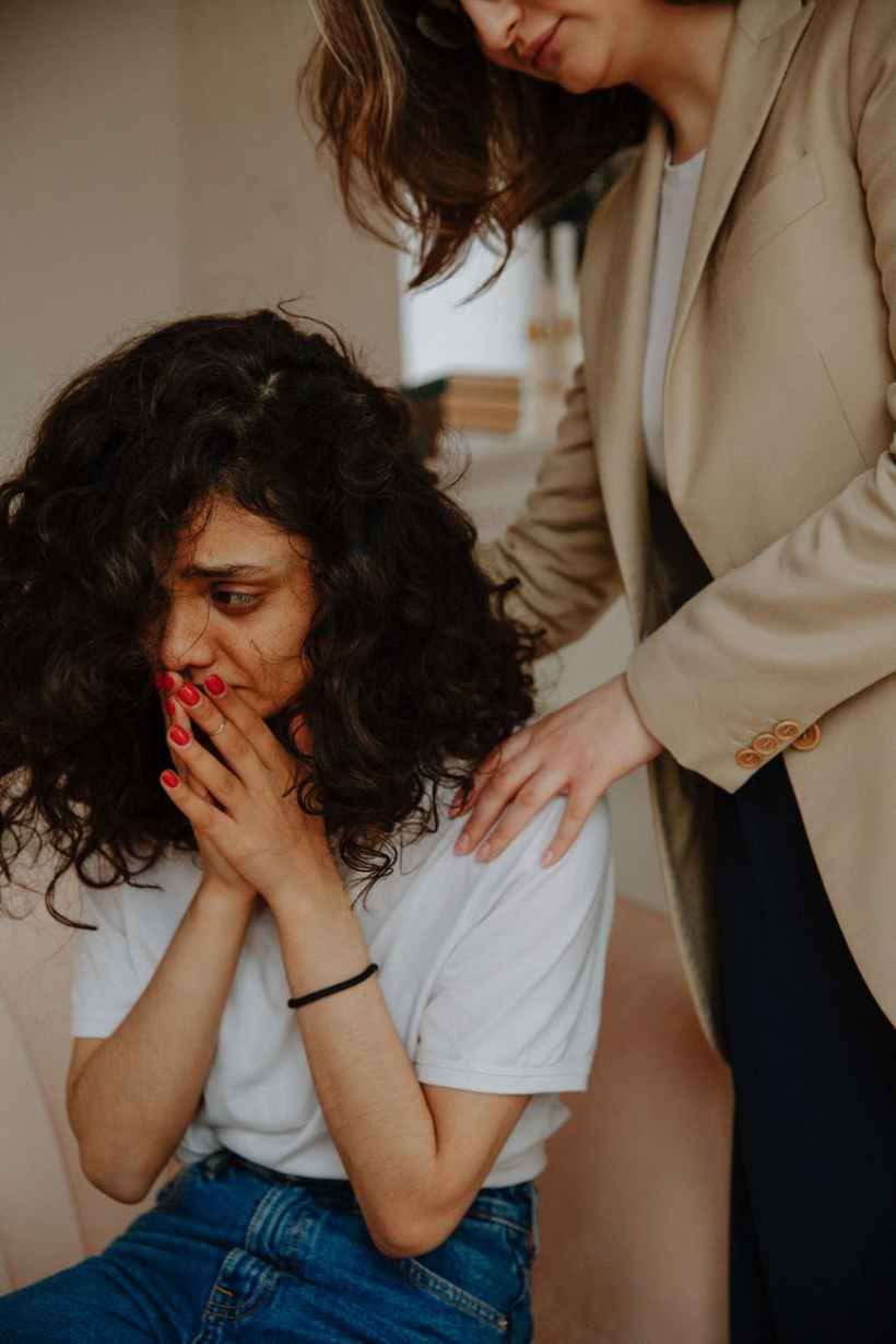 therapist comforting patient